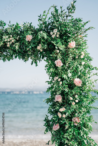 Wedding flower arch on the beach