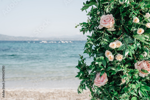 Wedding flower arch on the beach