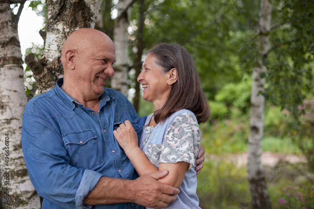 Portrait of caucasian senior couple in park Portrait of caucasian senior couple in park