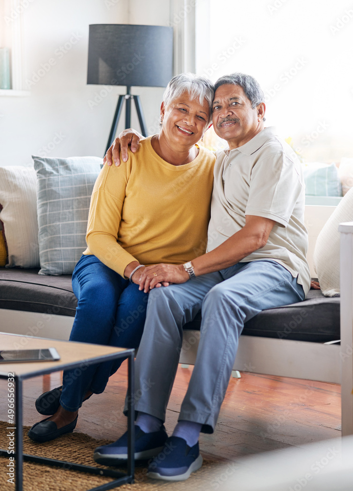 Our love will never die. Shot of a senior couple relaxing at home. Our love will never die. Shot of a senior couple relaxing at home.