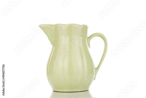 One ceramic milk jug, close-up, isolated on a white background. photo