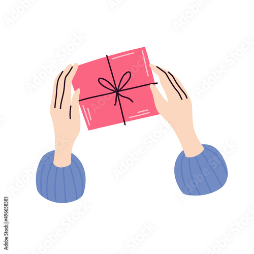 Hands holding a gift or present