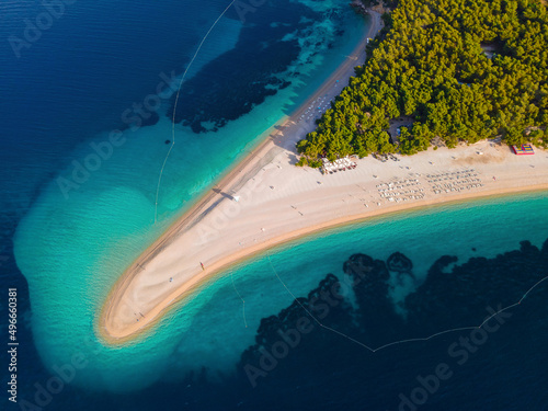 Aerial top down view of Zlatni rat beach on Adriatic sea, Bol, Brac island, Croatia photo