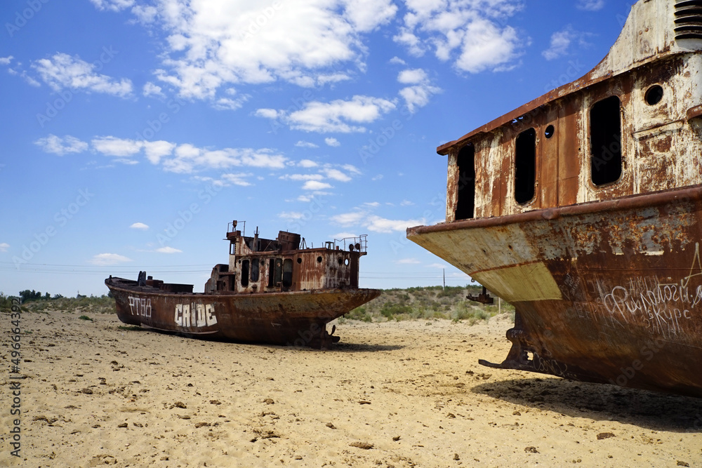 Rusted, abandoned fishing vessels on the former sea-bed of the Aral Sea, near Moynaq, Uzbekistan Rusted, abandoned fishing vessels on the former sea-bed of the Aral Sea, near Moynaq, Uzbekistan