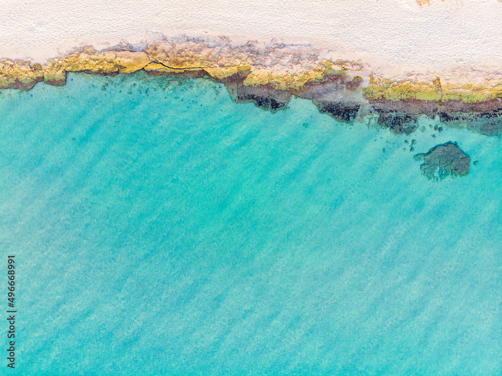 top view of turquoise sea and sandy beach