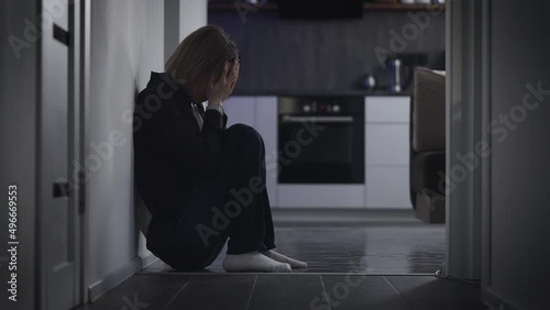 Sad woman in deep depression. The tragedy happened, and the grief is very strong. photo