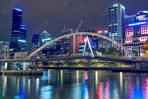 Southgate Footbridge spanning the River Yarra in Melbourne illuminated at night