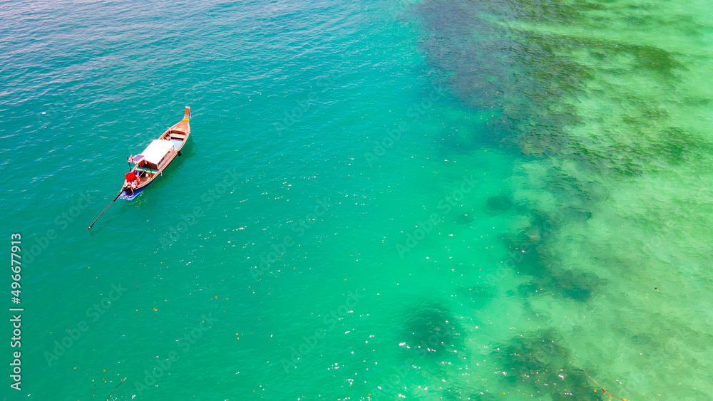Fototapeta premium High angle, beautiful sea, and tourists boats at Phi Phi Island, Phuket, Thailand