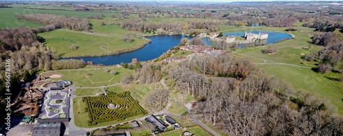 Aerial drone. Leeds Castle in Maidstone, Kent, England. It is built on islands in a lake formed by the river Len. photo