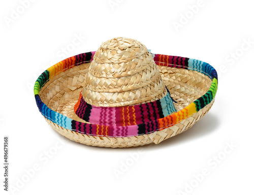 miniature straw sombrero on a white isolated background