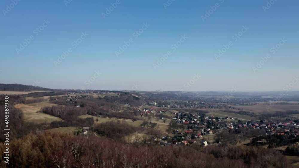 Drone aerial view of Kobylany village near Cracow Krakow. Early spring straight flight over towards Kobylany. Real time 4k UHD Drone aerial view of Kobylany village near Cracow Krakow. Early spring straight flight over towards Kobylany. Real time 4k UHD