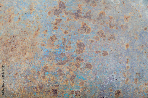 red rust stains on a metal background wall