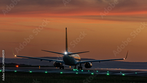 airplane takeoff at sunset Varna Airport