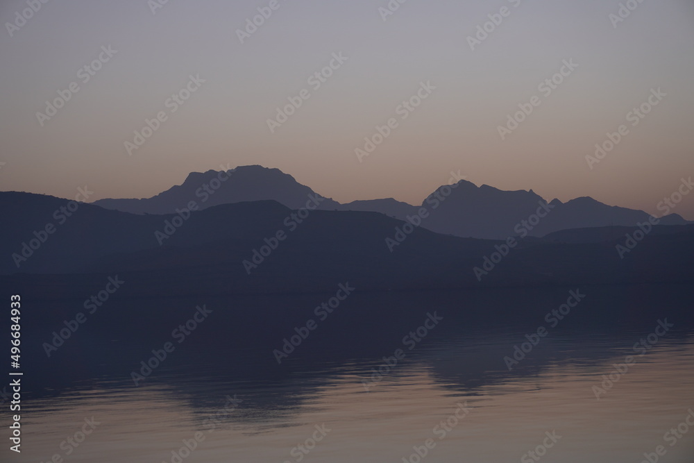 Silhoutte of the mountains over the sea