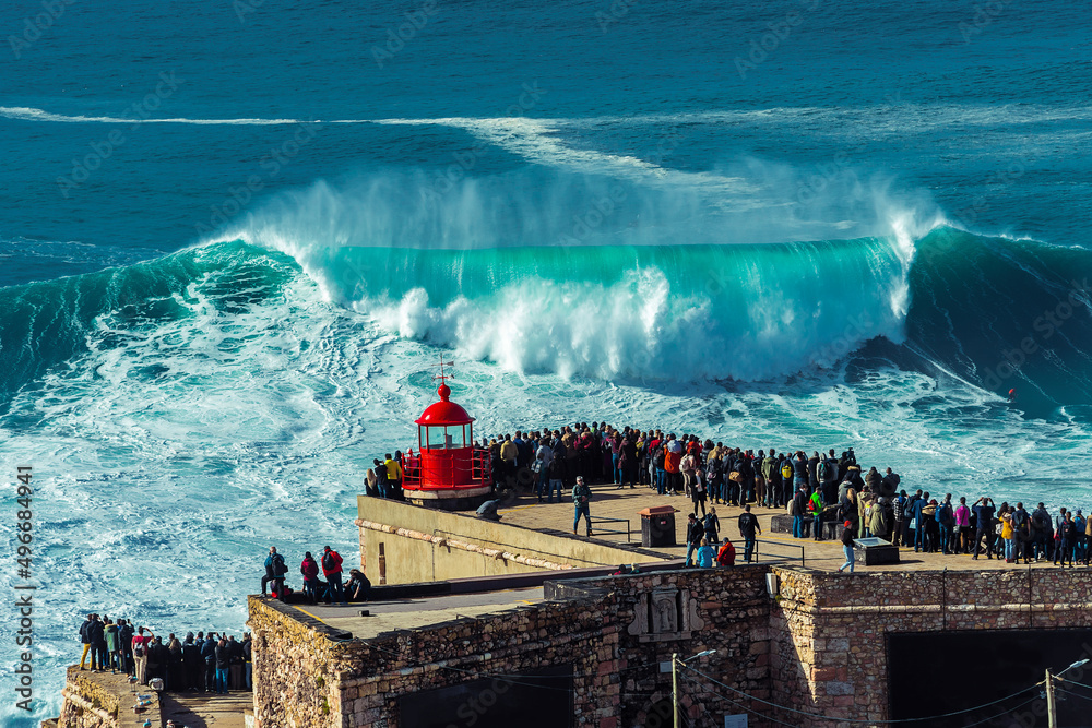 Big waves in Nazare, Portugal. Waves of the Atlantic Ocean in Portugal. Waves for surfing.