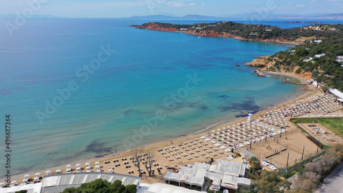 Aerial drone photo of famous celebrity sandy beach of Astir or Asteras in south Athens riviera with turquoise clear sea, Vouliagmeni, Greece