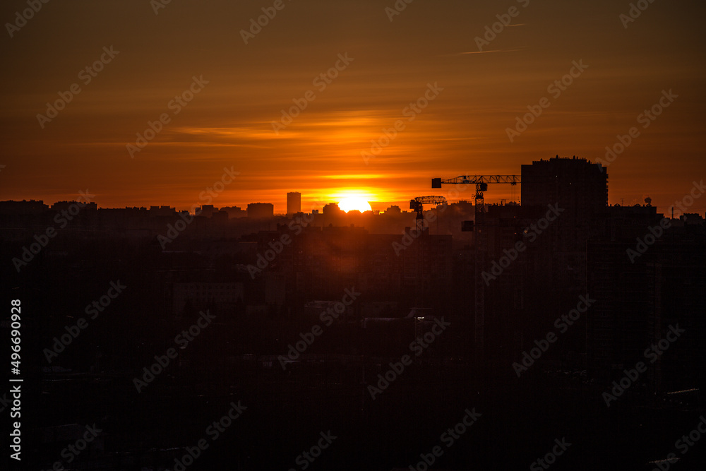 red sunset over high-rise buildings, panoramic view 