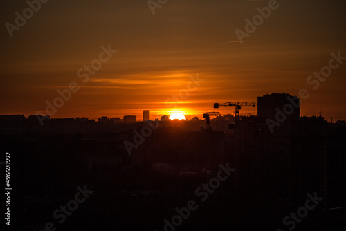 red sunset over high-rise buildings, panoramic view 