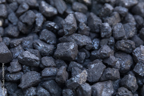 Pile of natural black hard coal for texture background. Coal energy.
