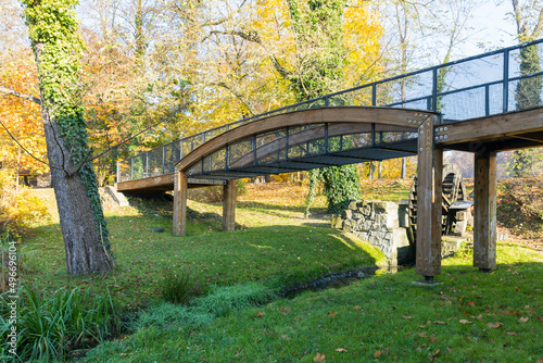 Bridge over the stream, steel and wood construction.
