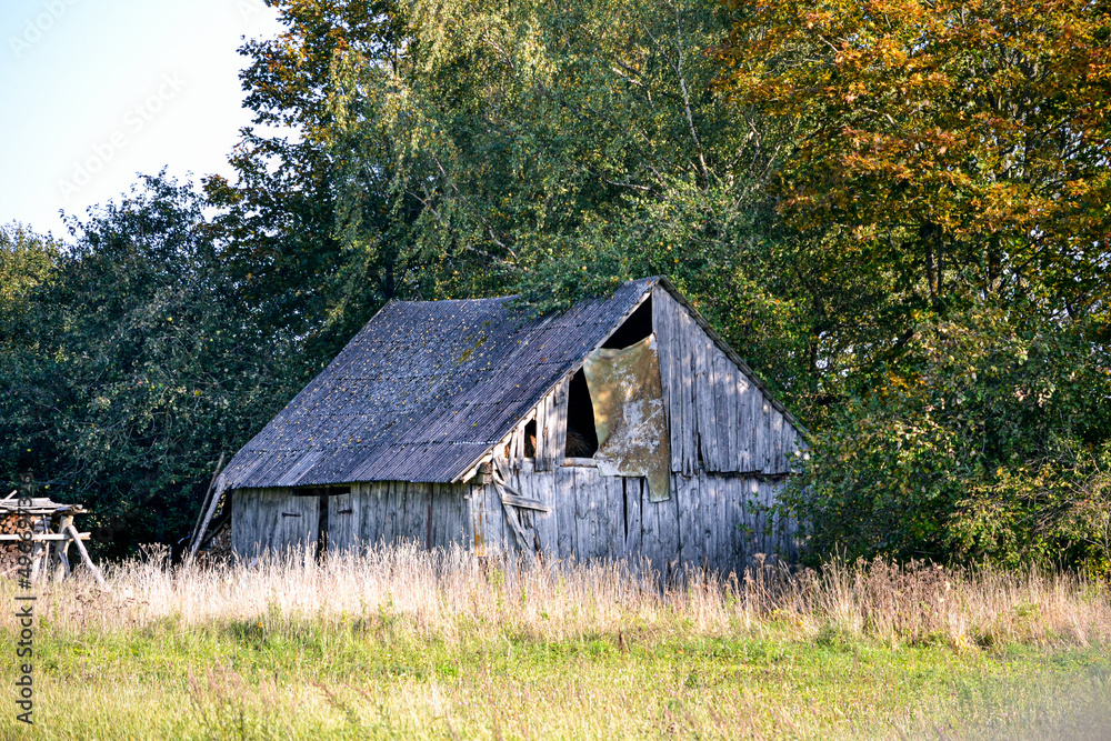 Old wooden barn building in the countryside.