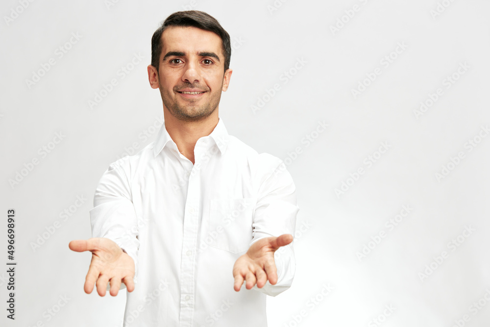 © SHOTPRIME STUDIO - businessmen white shirt posing stretches out his hands emotions isolated background © SHOTPRIME STUDIO - businessmen white shirt posing stretches out his hands emotions isolated background