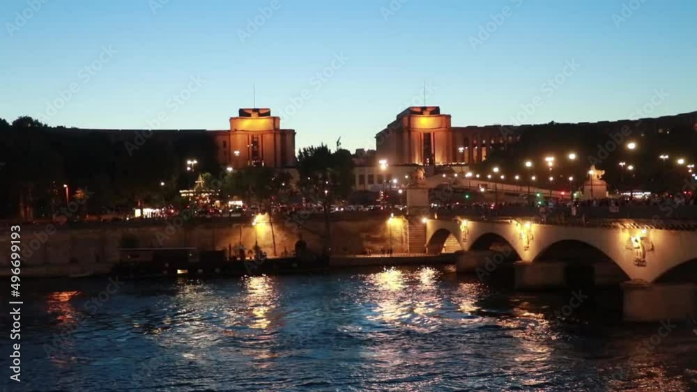 A view of the Seine river at night in Paris A view of the Seine river at night in Paris