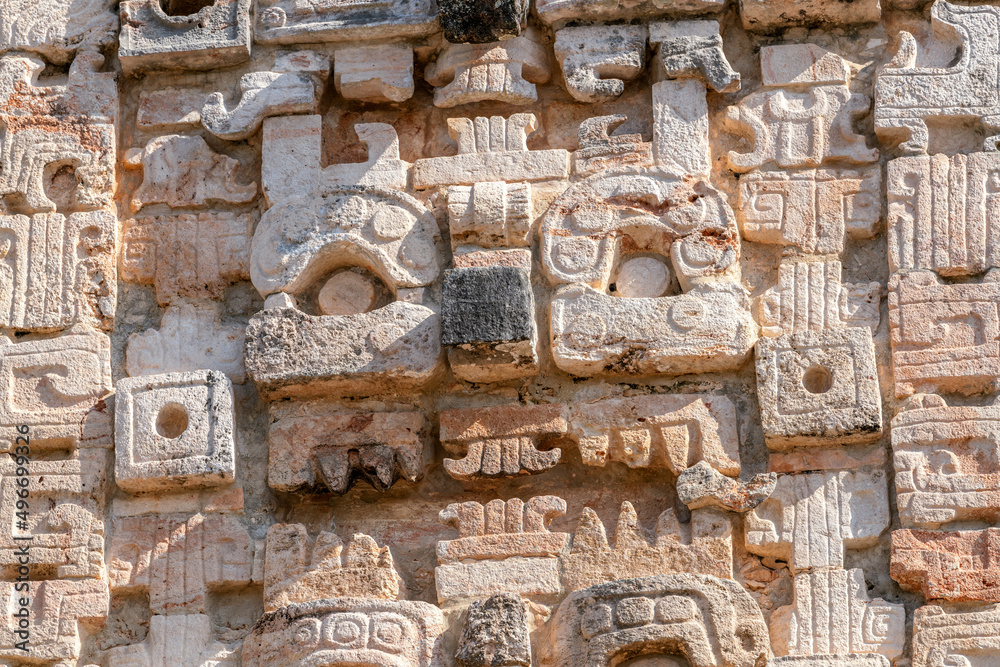 Mayan stone carvings on the wall of the Nunnery Quadrangle at Uxmal archaeological site, Yucatan, Mexico, UNESCO World Heritage Site