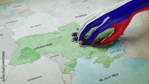 3D render concept of Russian occupation, a hand with a Russian flag texture takes away eastern Ukraine, taking away land then crumbles and collapses. photo