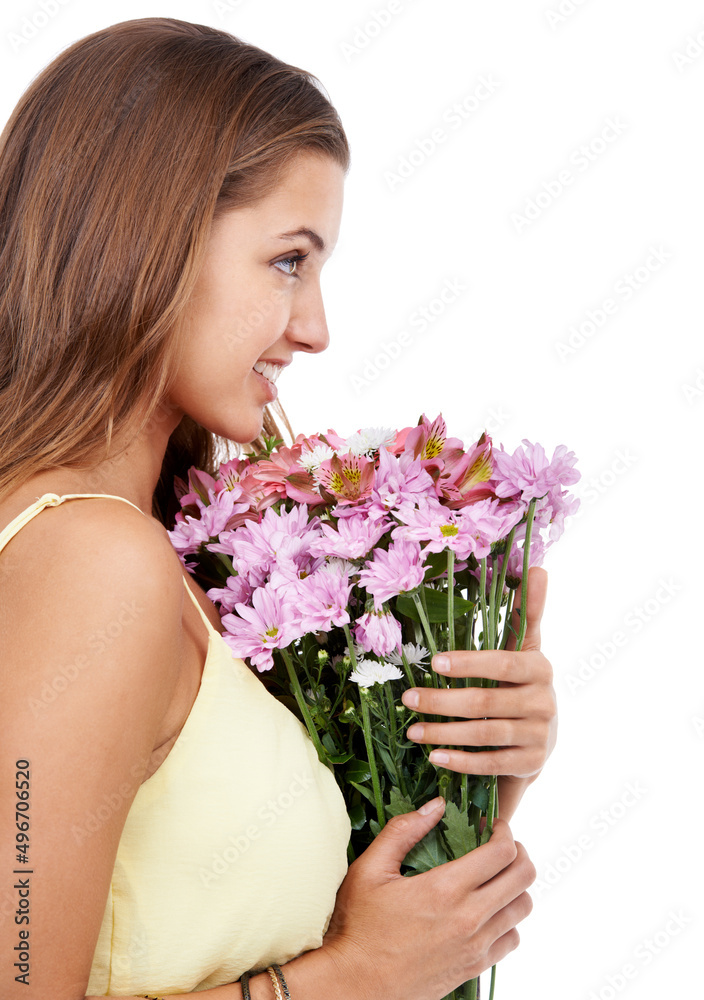 Flowers says it best.... A young woman holding a bouquet of fresh flowers.