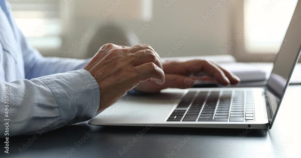 Close up older woman hands texting e-mail on modern laptop keyboard, writing message use wireless computer, lead correspondence to client remotely, search information on internet. Technology concept