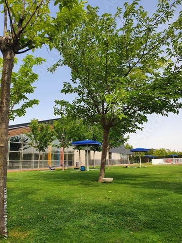 landscape of a public city swimming pool without people on a sunny day