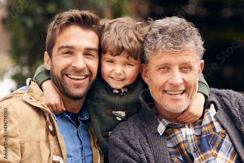 Three generations of the boys. Shot of a grandfather, his adult son and grandson enjoying a day outdoors. © Duncan M/peopleimages.com
