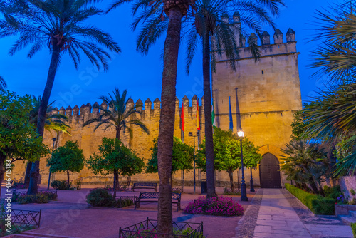 Night view of alcazar de los reyes cristianos - royal palace of the cristian kings in the spanish city cordoba. photo