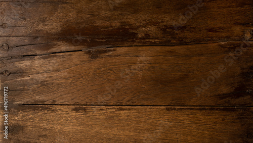 Brown wood background texture with dark tone color