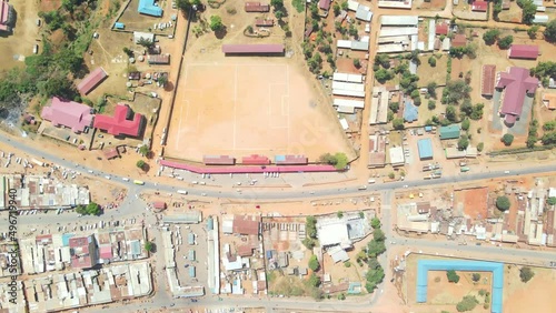 urban setting with unassuming buildings and poor roads in Kenya, Africa. aerial drone view kamatira in west pokot, kapenguria, Kenya. photo