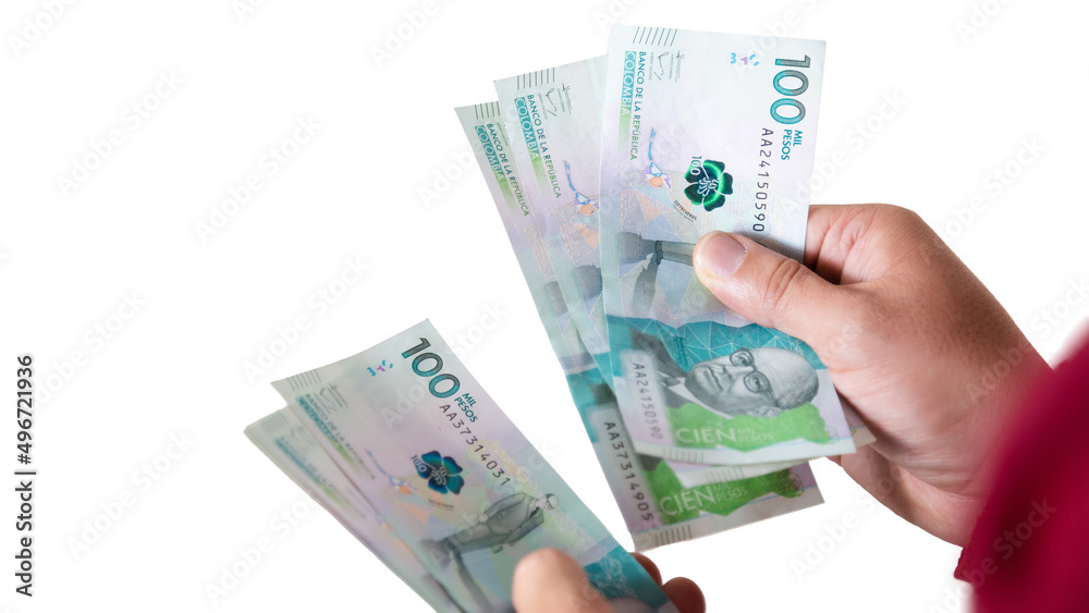 latin man counting colombian money , red sack, businessman or entrepreneur on white background latin man counting colombian money , red sack, businessman or entrepreneur on white background