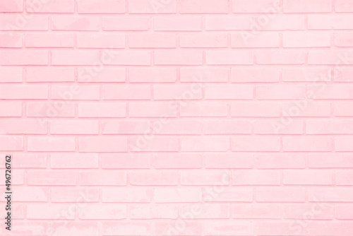 Pastel pink and white brick wall texture background. Brickwork pattern stonework flooring interior stone old clean concrete grid uneven brick design decoration.