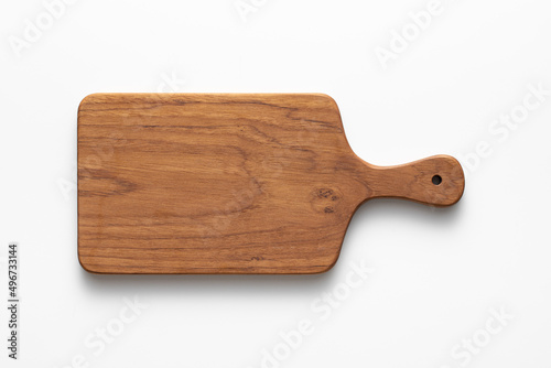 Handmade teak wood chopping board on white background. Handmade wooden chopping board.