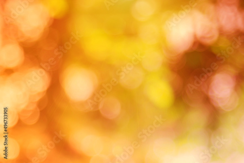 Abstract blurry orange color for background, Blur festival lights outdoor celebration and white bokeh focus