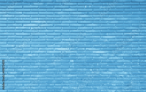 Brick wall painted with blue paint pastel calm tone texture background. 