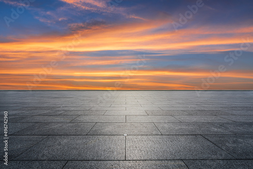 Empty square floor and sky sunset clouds background