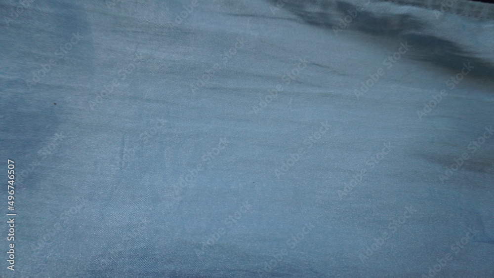 Naklejka premium blue fabric background