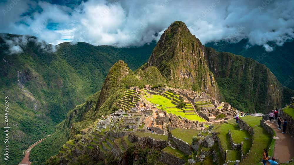 Machu Picchu Peru South America the lost city of Inca not far from Cusco city in the high mountains UNESCO World Heritage site timelapse ancient Inca ruins mysteries of the Inca Empire clouds