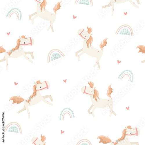 Cute cartoon ponies. Vector seamless pattern with white horses, rainbow and hearts. Isolated on white background. 