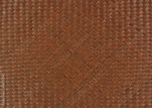 Weaving with a zigzag pattern of brown color close-up photo