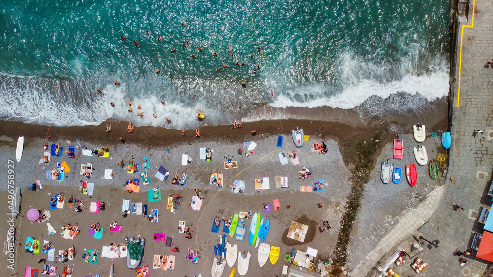 Overhead aerial view of Positano Beach on a beautiful summer day.