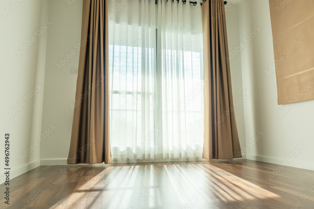 Curtain window interior decoration in living room on sunny day with sunlight Curtain window interior decoration in living room on sunny day with sunlight