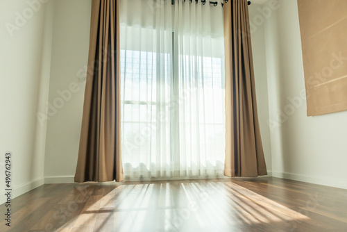 Curtain window interior decoration in living room on sunny day with sunlight