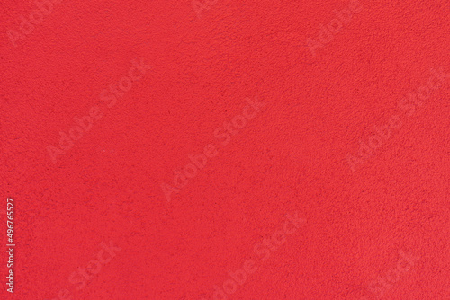 The walls are made of red cement plaster with a rough surface. For texture background images